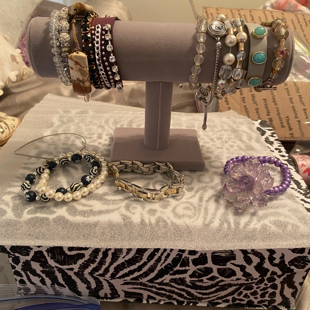 Group of Elegant fashion bracelets including Beaded, cuff, and snap bracelets